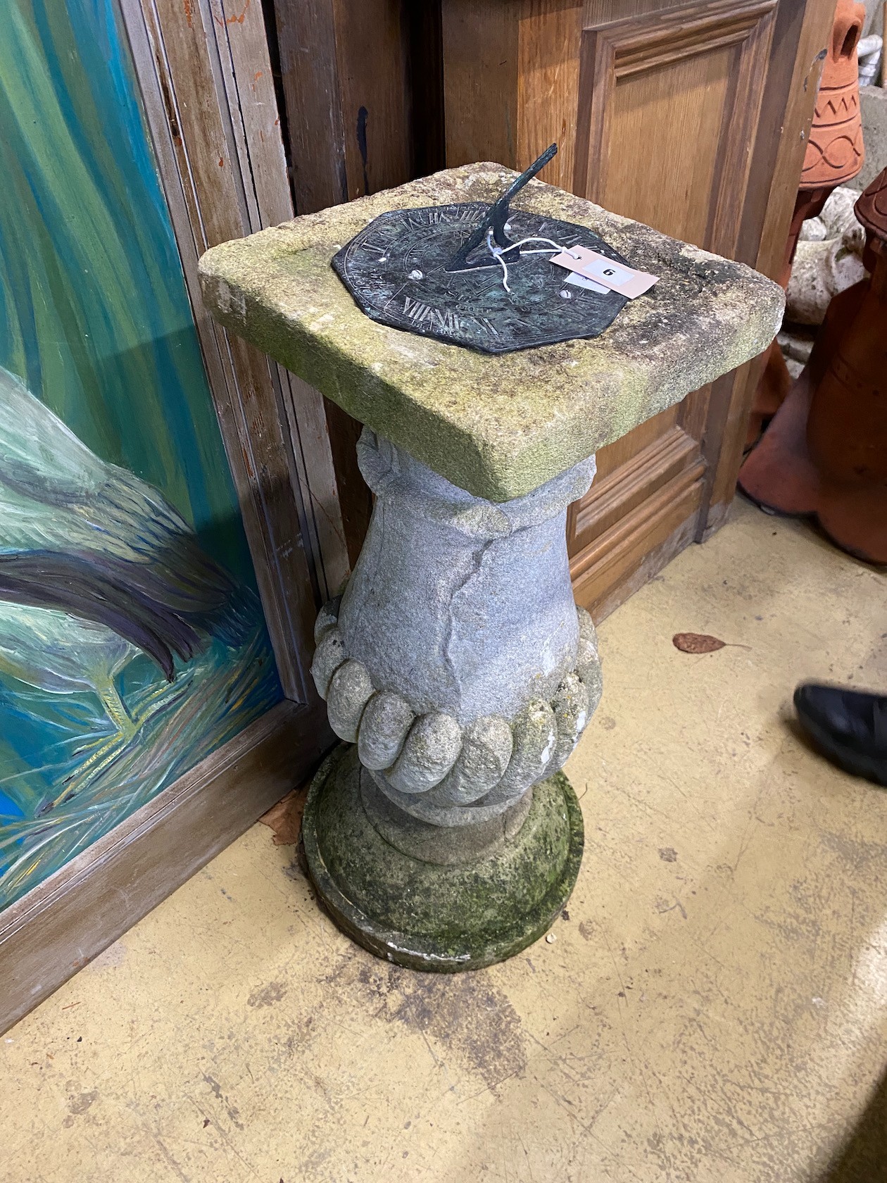 A 17th century style bronze sundial, with reconstituted stone baluster plinth, width 30cm, height 77cm
